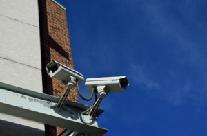 two cameras under the blue sky